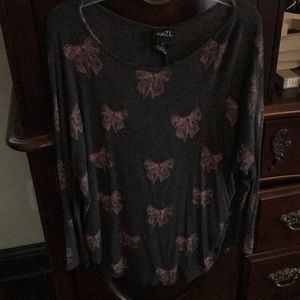 Light weight tunic top with bows